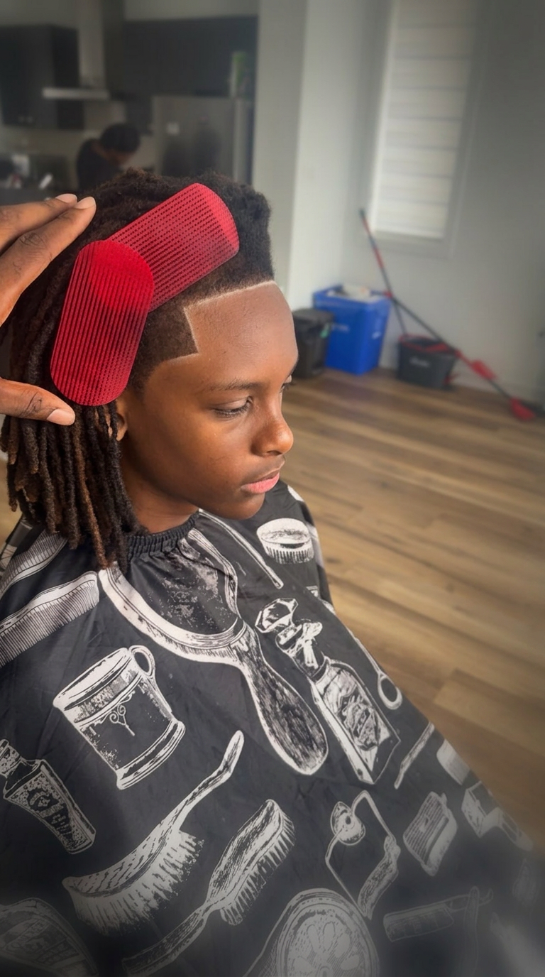 Client with a sharp taper fade lineup by FadedByCee